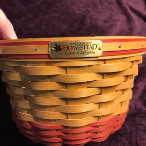 Longaberger basket with handle and clear liner.